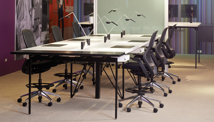 Antenna Workspaces Big Table, featuring new Sparrow™ LED lights, is a space efficient solution to a team work environment