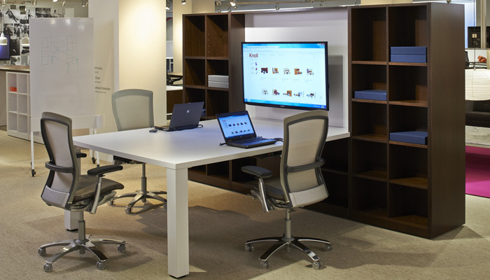 The combination of bookcases and new cabinets and worksurfaces creates a classic yet functional, modular meeting environment