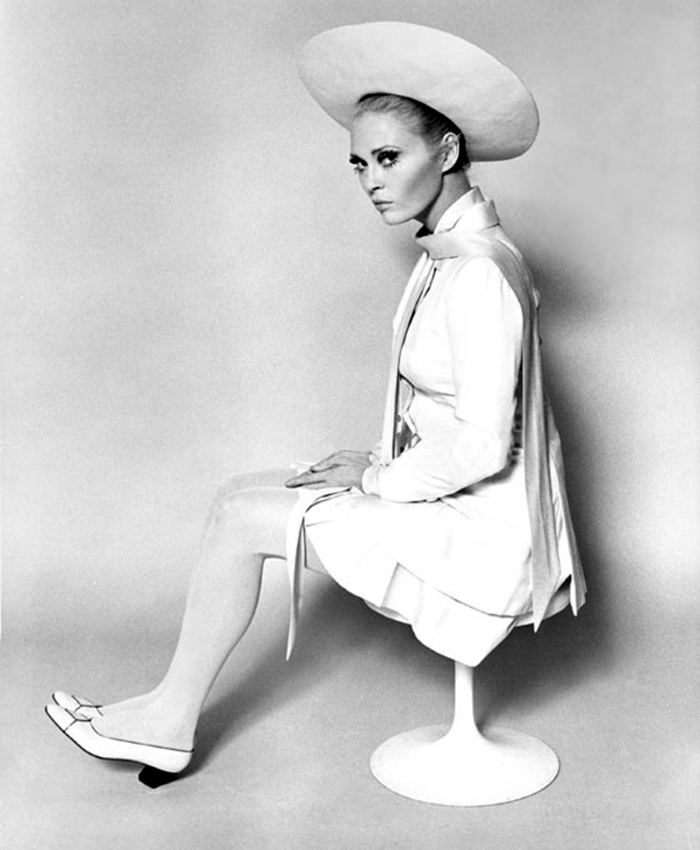 Actress Faye Dunaway seated in Eero Saarinen's Tulip Stool. Publicity Still from The Thomas Crown Affair.