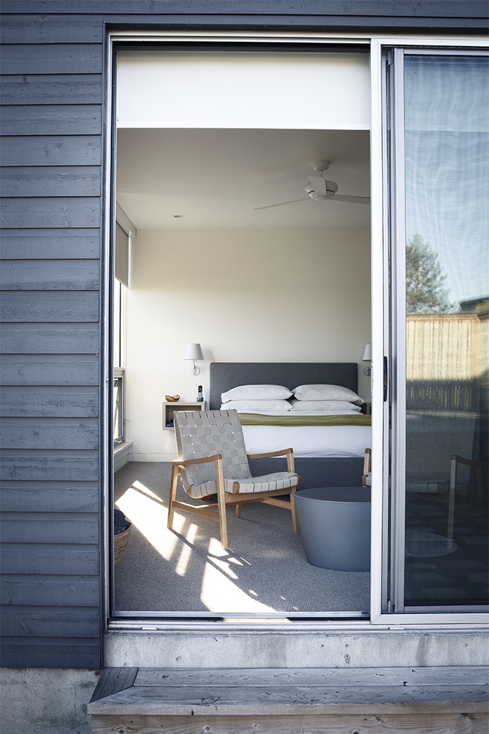 Richard Williams Architects | Jens Risom Lounge Chair and Maya Lin Stone Coffee Table at Twitter House Lake Ontario, Canada