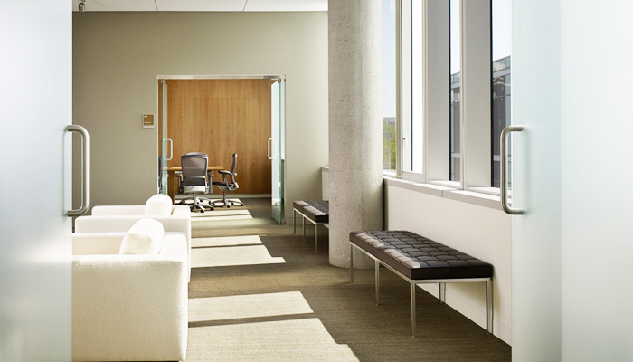 Waiting area with Florence Knoll Benches and SM2 Lounge Chairs