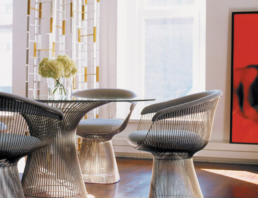 Platner Dining Table with polished nickel base and Platner Arm Chair