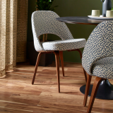 the spring forward collection eclat weave upholstery on saarinen executive armless chair cyclone drapery