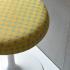 The Focus Collection Circle Point Upholstery in Daffodil on Tulip Stool