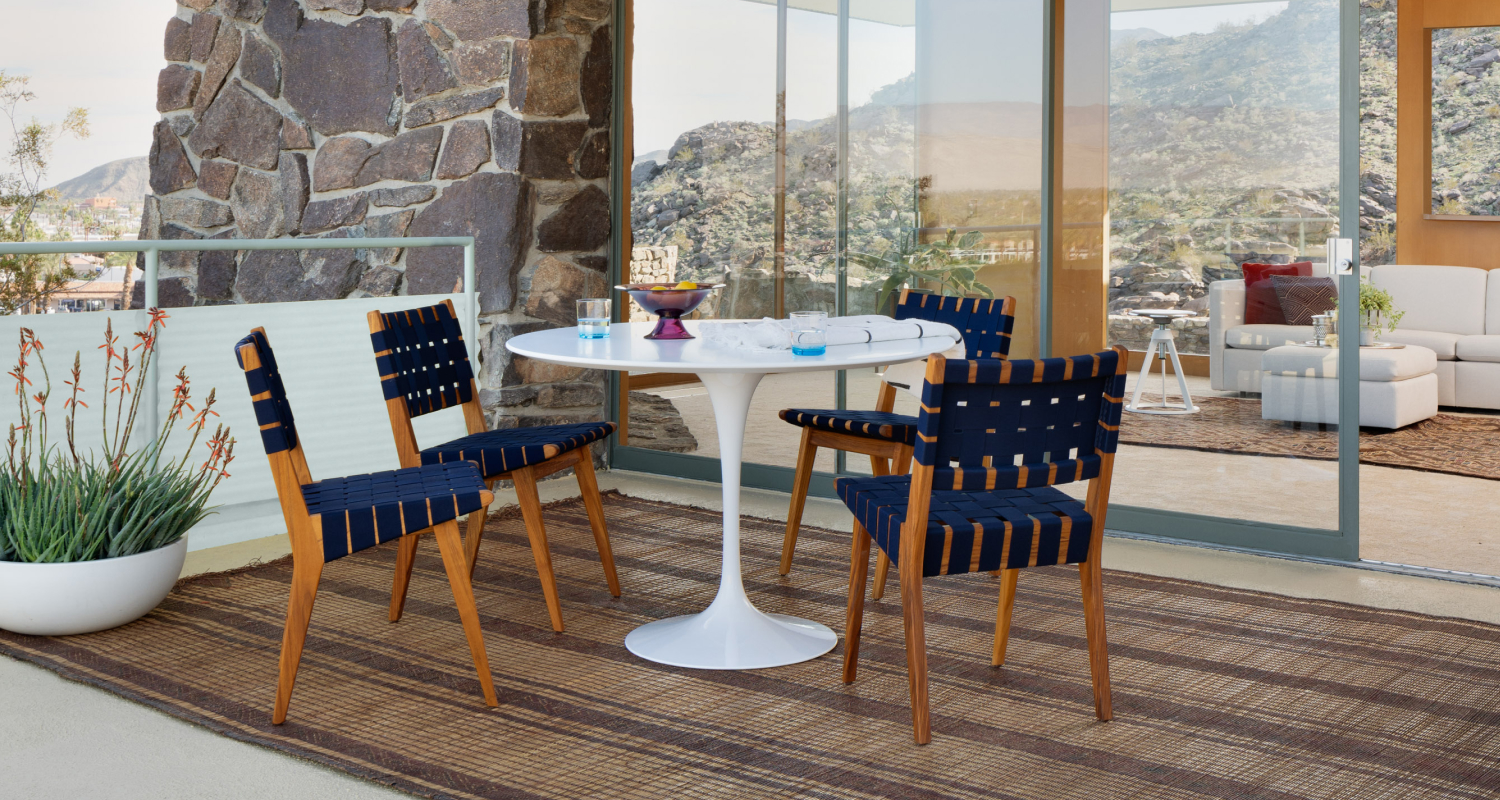 Knoll Outdoor Saarinen Dining Table with Risom Side Chairs