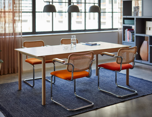 cesca chair marcel breuer split upholstered caned back muuto linear wood table meeting space conference room