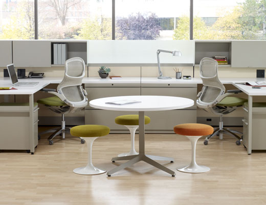 Dividends Horizon workstations with shared overhead storage and Generation chairs