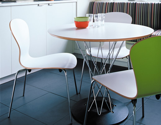 Cyclone Dining Table by Isamu Noguchi and white Sprite chair by Ross Lovegrove