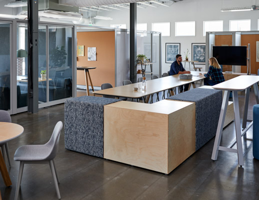 rockwell unscripted creative wall fixed fins glass fins booths banquettes private niche k. lounge cork library table upholstered steps tall table drink rail upholstered seats small round sawhorse table muuto fiber side chairs hospitality team meeting