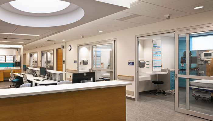 Caregiver workstations incorporating AutoStrada® Service Wall and Reff Profiles™ Systems Furniture and Sapper™ Monitor Arms