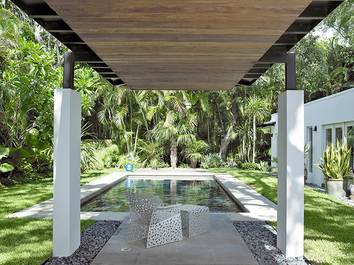 Richard Schultz's Topiary Lounge Chair Poolside at Lourdes Fernandez-Grattan's Miami Home